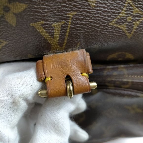 Louis Vuitton Monogram Canvas Backpack in Brown and Tan